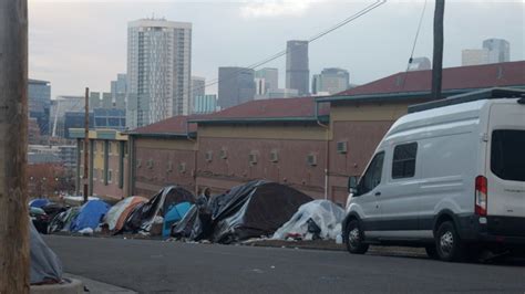 Migrant advocates say encampment could encircle shelter near downtown Denver